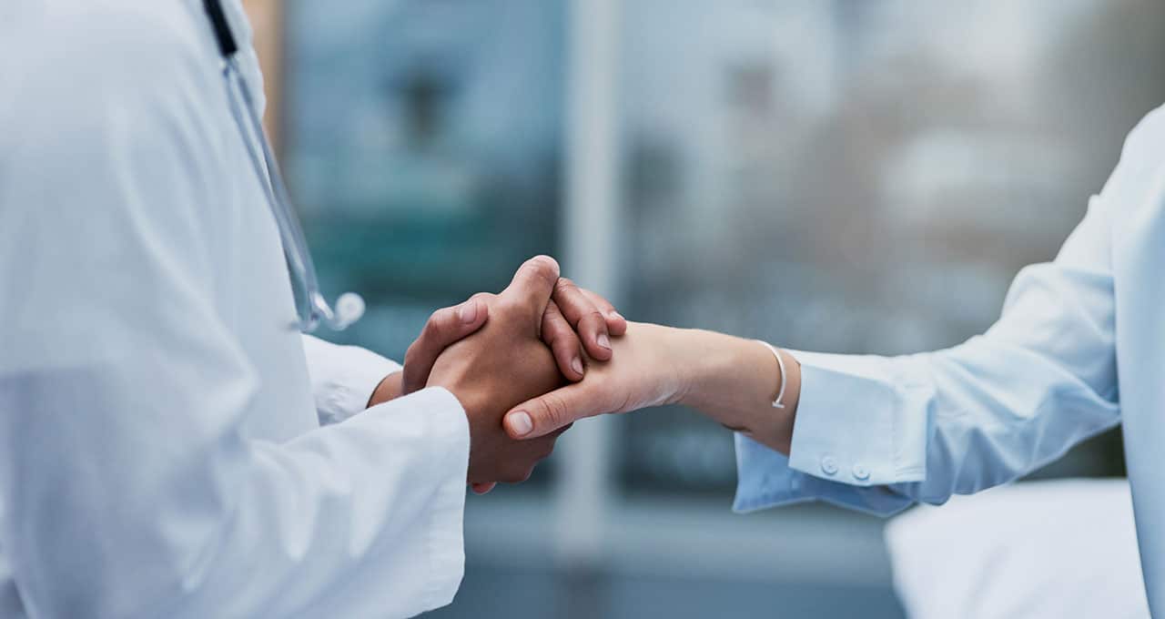 Doctor and Zaajil courier handshake
